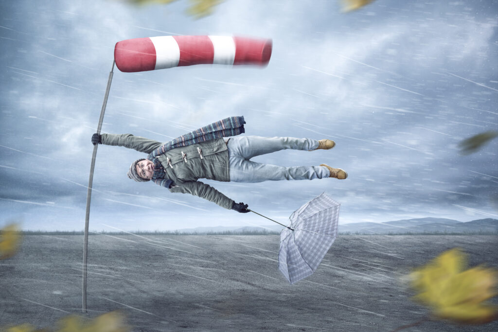 Funny man gets blown away by a storm